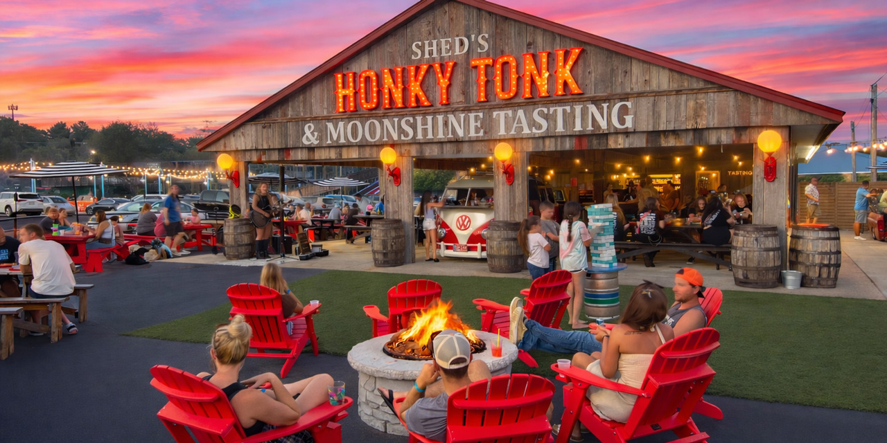 Exterior of a bar with a large outdoor patio with outdoor bar and live music playing.