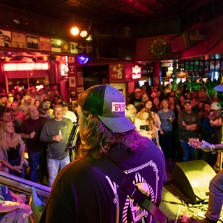 Rock band playing at Showboat Saloon's stage