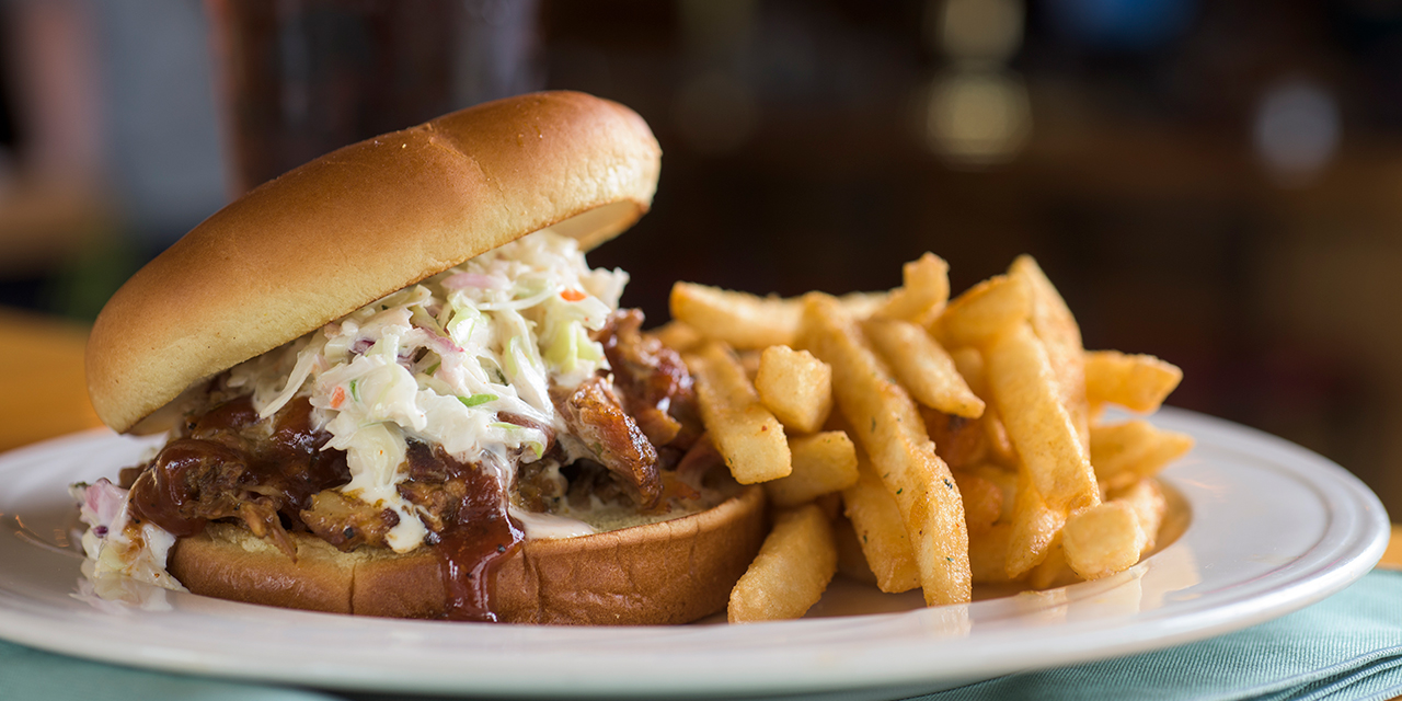 A sandwich and french fries at Spring Brook Sports Bar & Grill.