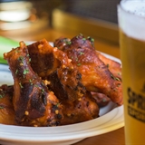 Chicken wings and a beer at Spring Brook Sports Bar & Grill.