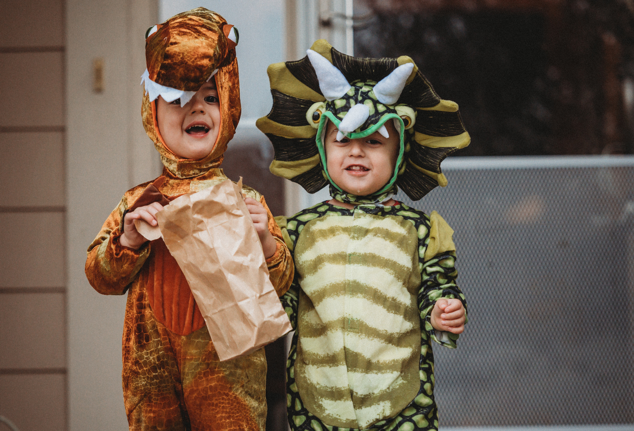 2 children in halloween costumes