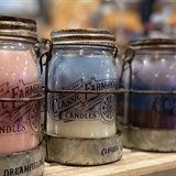 A variety of mason jar candles.