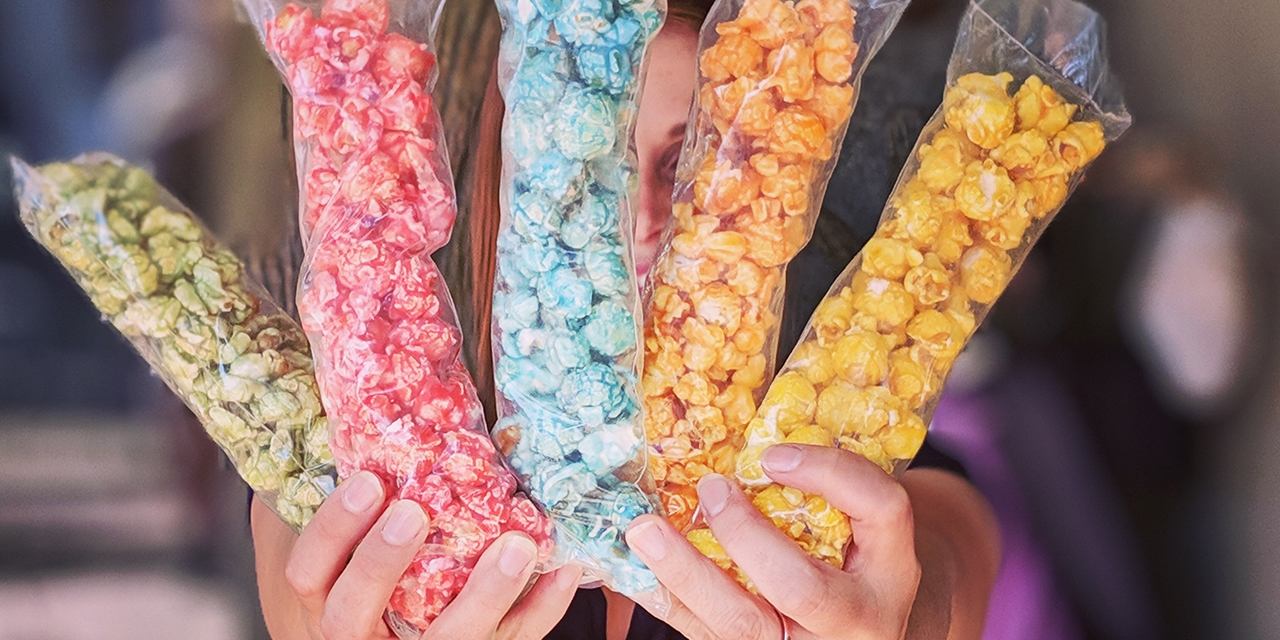 A bunch of popcorn flavors from Oodlesmack Popcorn.