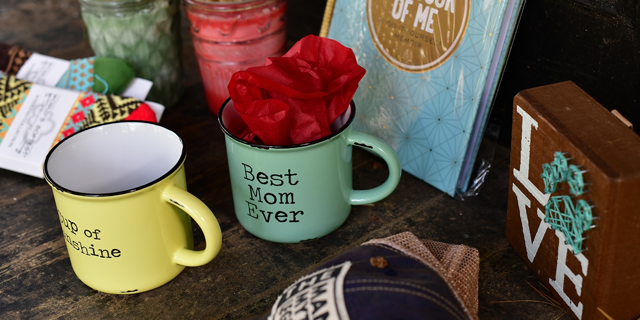 Coffee mugs, a hat, socks, and other décor from Winnebago Gift Shop.